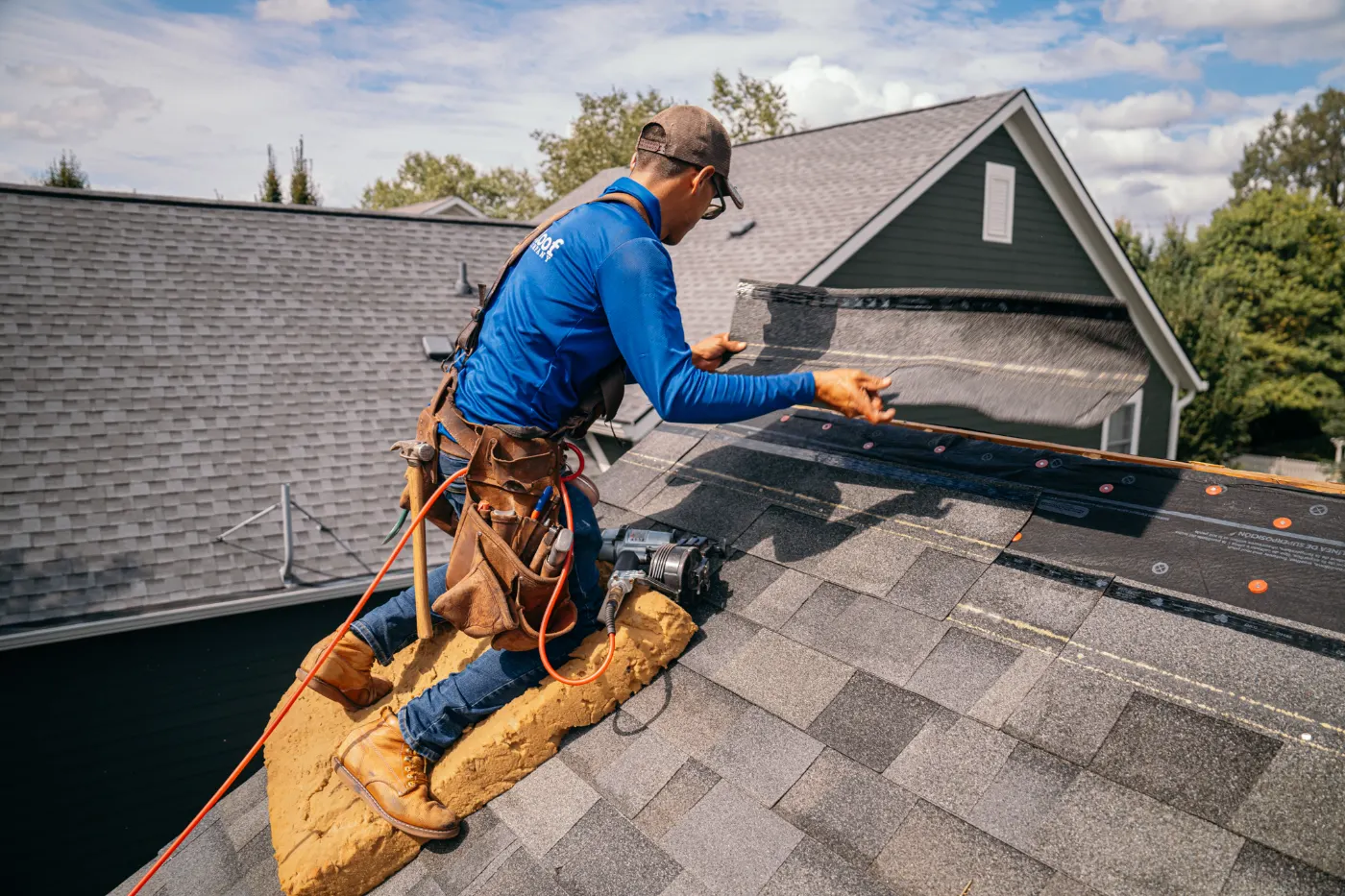 Tarping and dry-in on a Spring Mill commercial roof